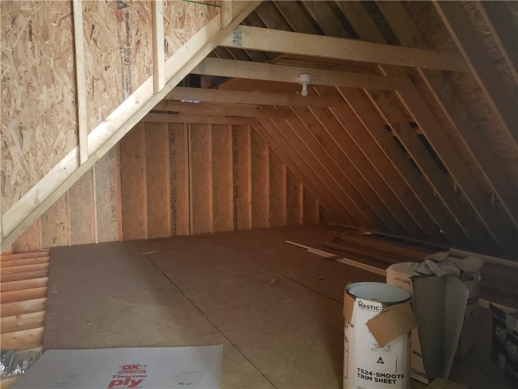 295 Hutchman Road Mars, PA 16046 - Photo 25 of 25 Large unfinished area above garage with full sized access door on second floor makes a great storage room with easy access.
