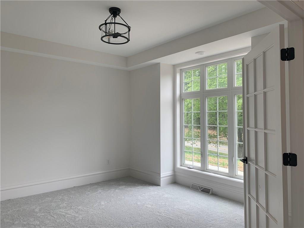 295 Hutchman Road Mars, PA 16046 - Photo 7 of 25 Bright and open den with glass pane french doors with view of the front yard!