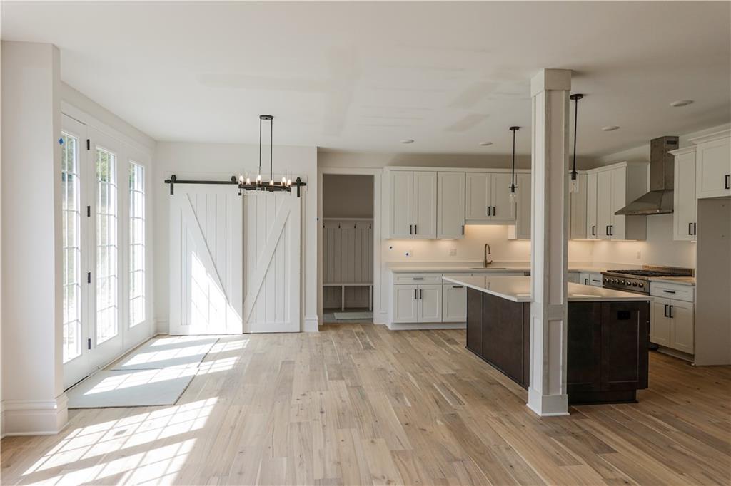 295 Hutchman Road Mars, PA 16046 - Photo 8 of 25 Plenty of room for the whole family in this kitchen with space for table and counter top seating !