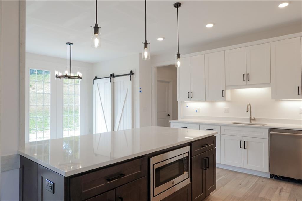 295 Hutchman Road Mars, PA 16046 - Photo 10 of 25 Look at this kitchen! Huge 7'x4' island with counter top seating!