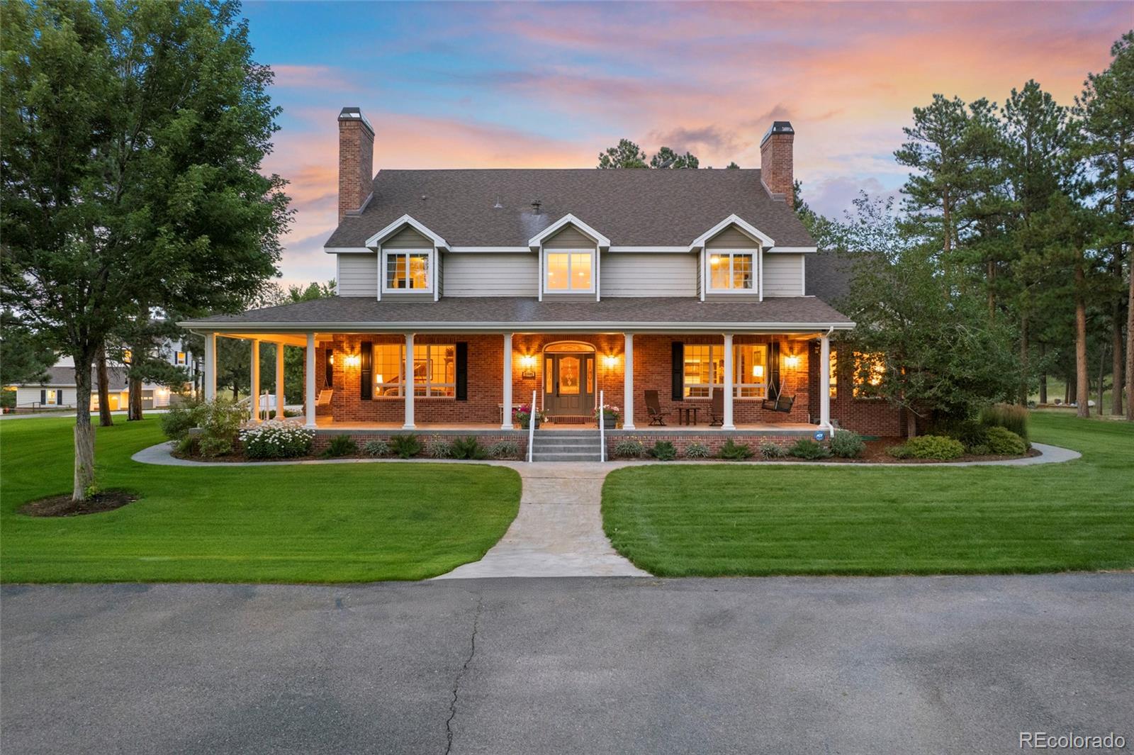 38666 County Road 21 Elizabeth, CO 80107 - Photo 47 of 48 a front view of a house with a yard