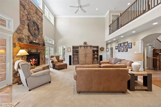 a spacious bedroom with a bed and a couch