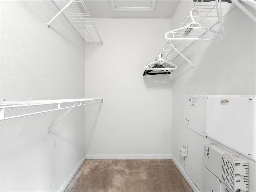 2617 Redford Way Wesley Chapel, FL 33544 - Photo 16 of 21 a view of walk in closet