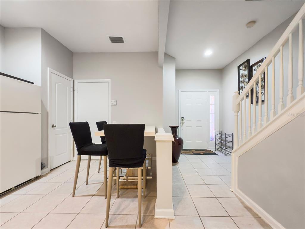2617 Redford Way Wesley Chapel, FL 33544 - Photo 5 of 21 a view of a room with table and chairs