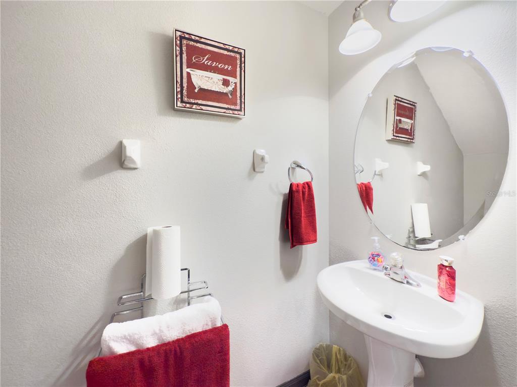 2617 Redford Way Wesley Chapel, FL 33544 - Photo 9 of 21 a bathroom with a sink and a mirror