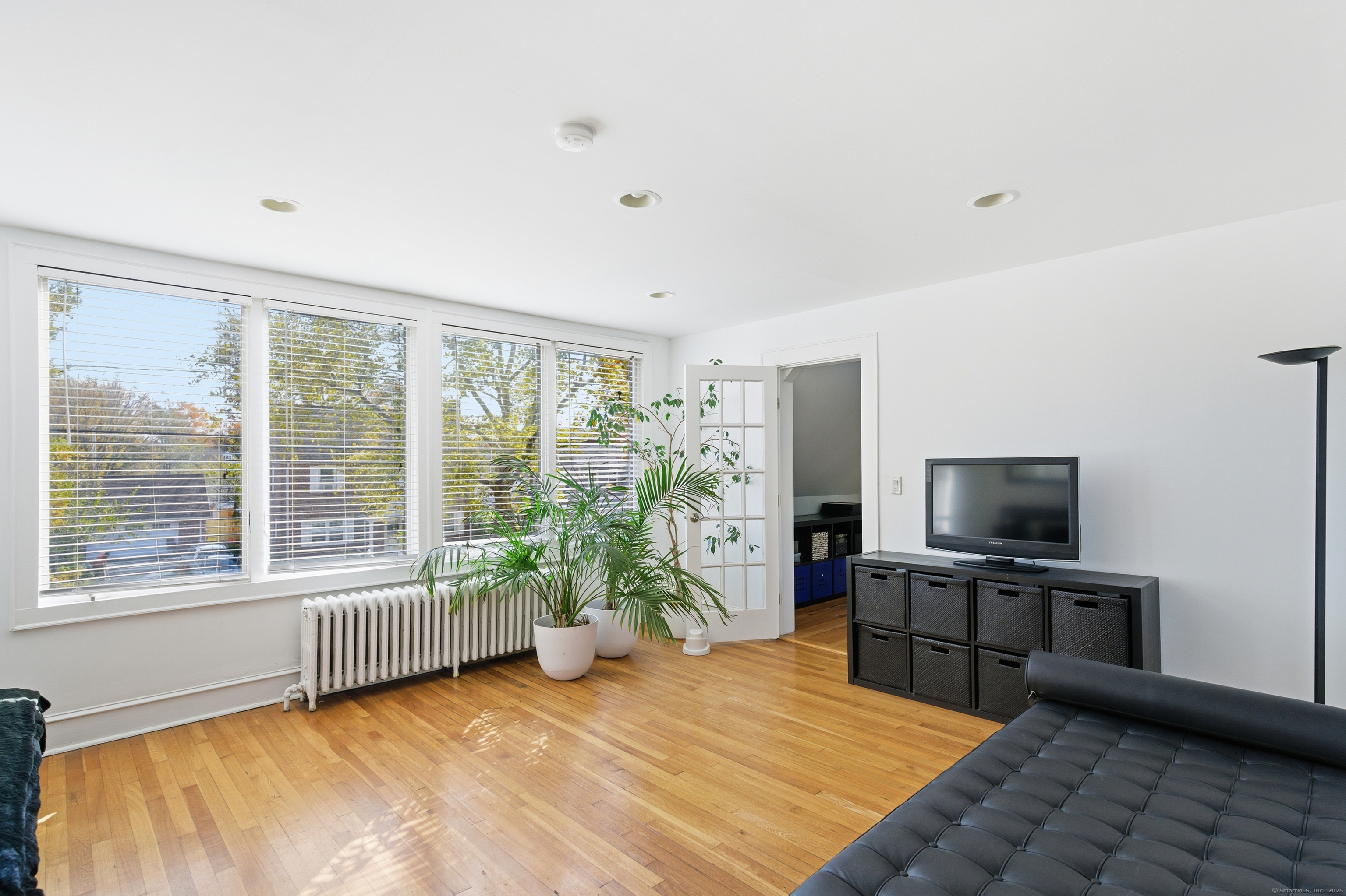 2345 Park Avenue Bridgeport, CT 06604 - Photo 20 of 39 a living room with furniture and a flat screen tv