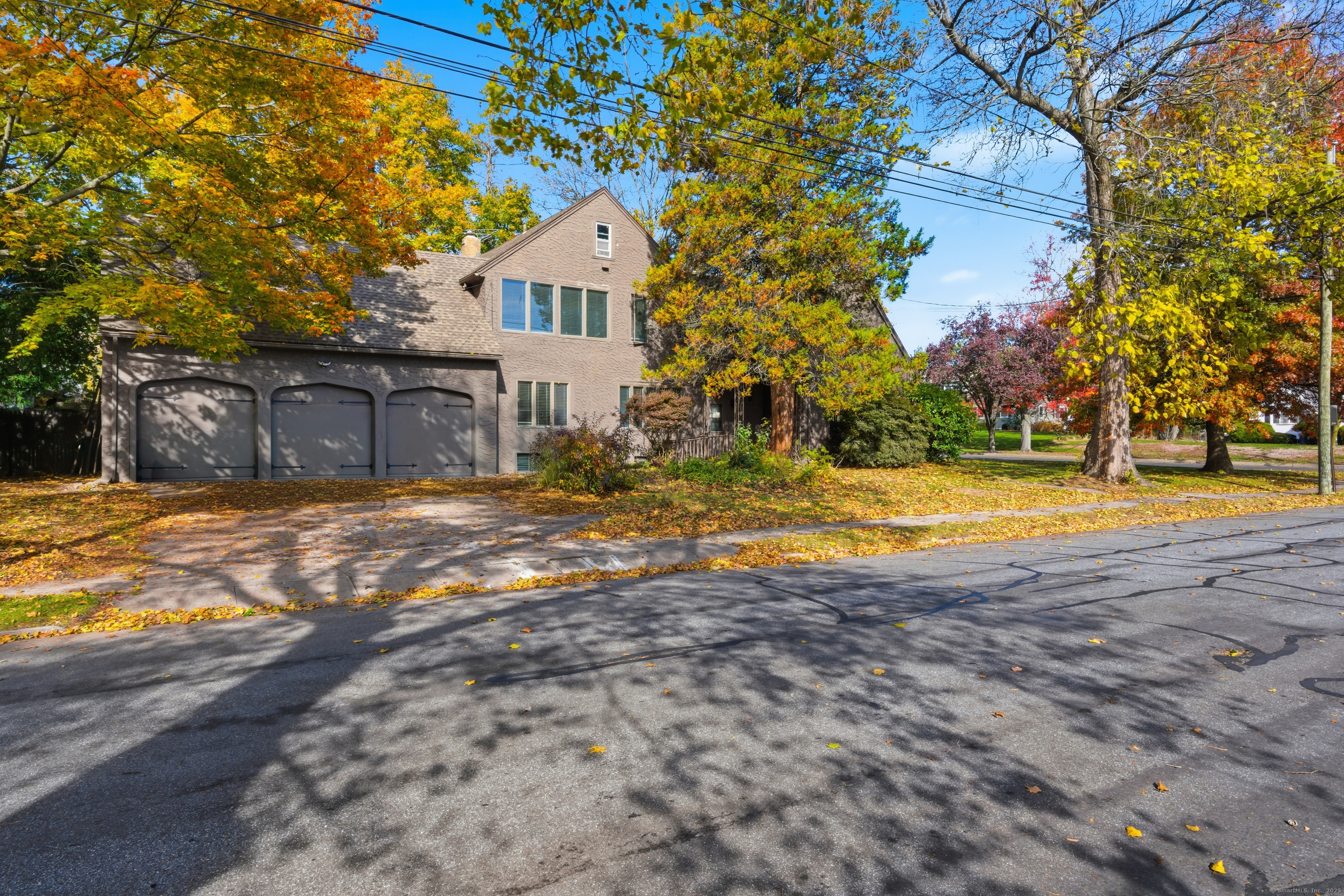 2345 Park Avenue Bridgeport, CT 06604 - Photo 2 of 39 a view of a swimming pool with a house in the background