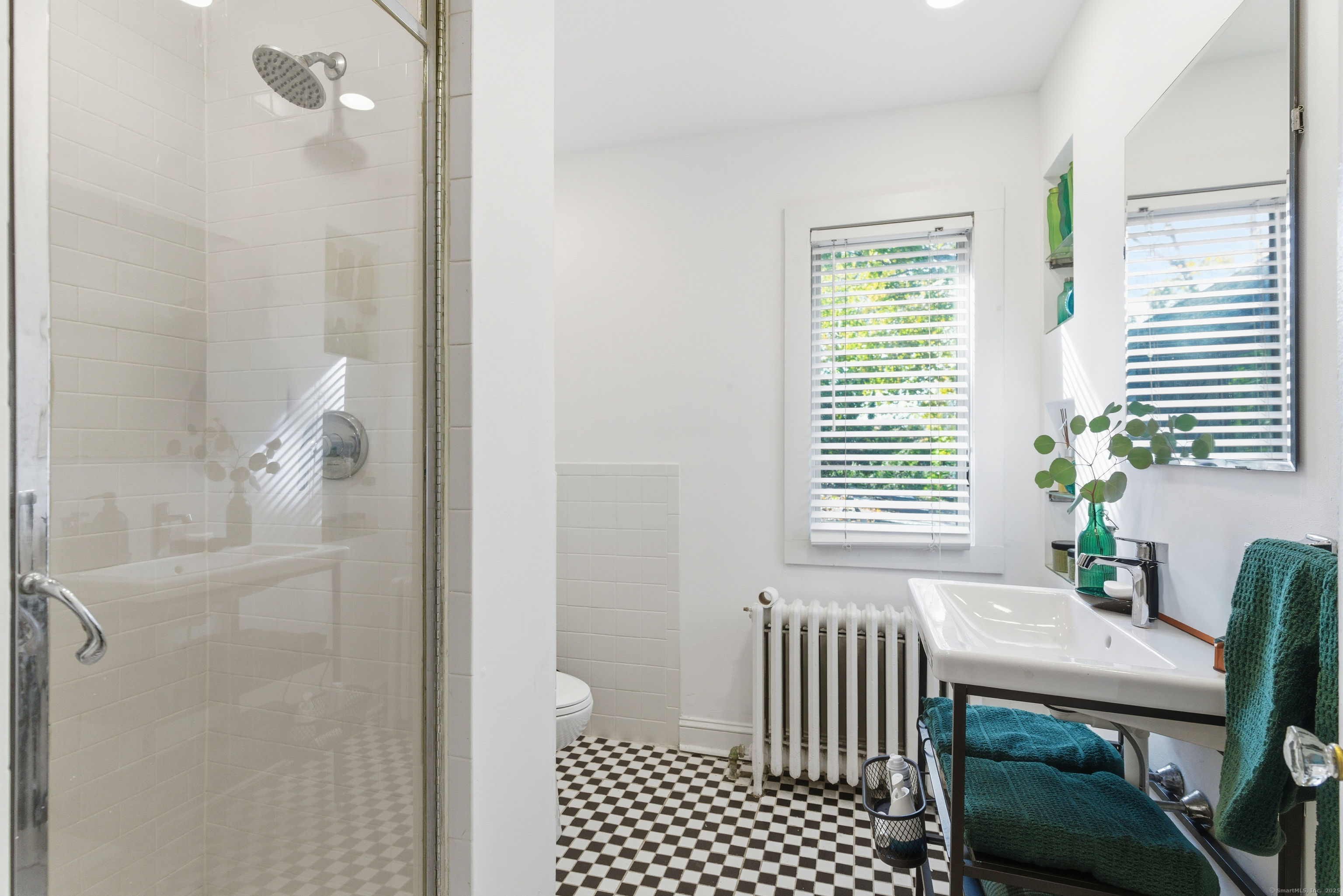 2345 Park Avenue Bridgeport, CT 06604 - Photo 27 of 39 a bathroom with a bathtub and a shower