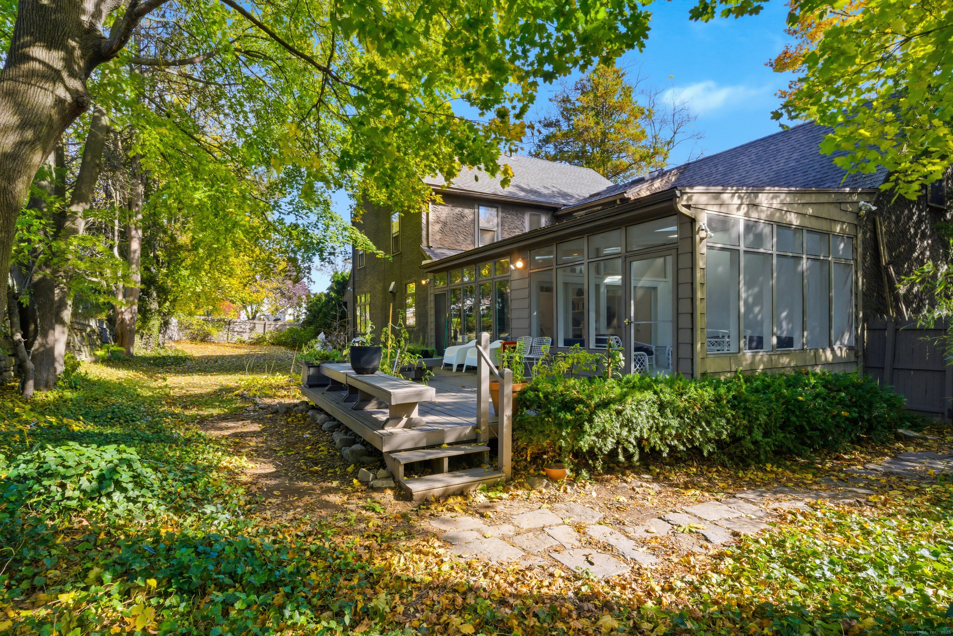 2345 Park Avenue Bridgeport, CT 06604 - Photo 34 of 39 a view of a chair and tables in the backyard of the house