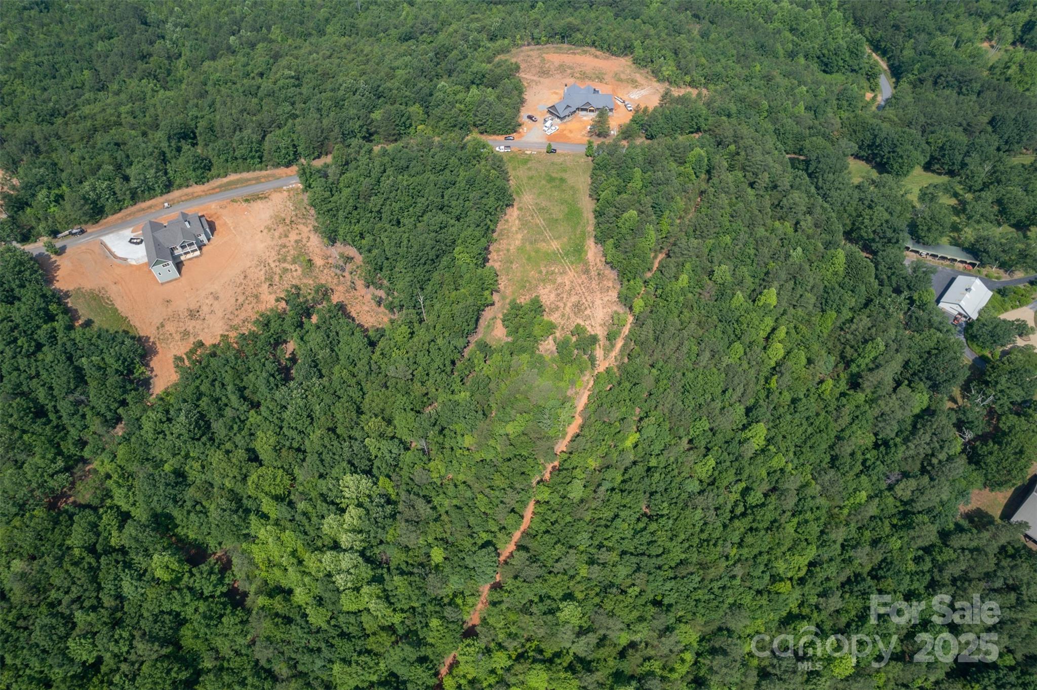 Lot 11 Prospect Point Drive Tryon, NC 28782 - Photo 11 of 16 a view of a yard with plants and wooden fence