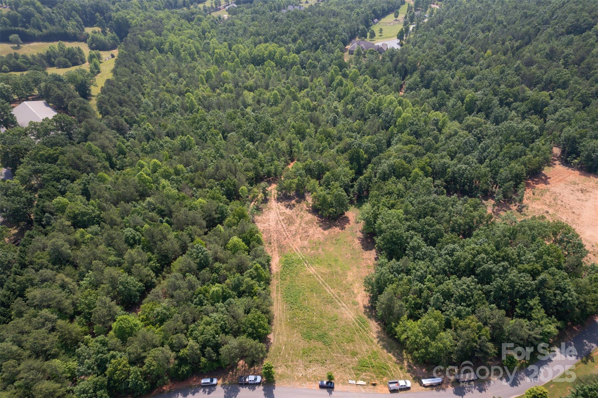 Lot 11 Prospect Point Drive Tryon, NC 28782 - Photo 7 of 16 an aerial view of a houses with yard