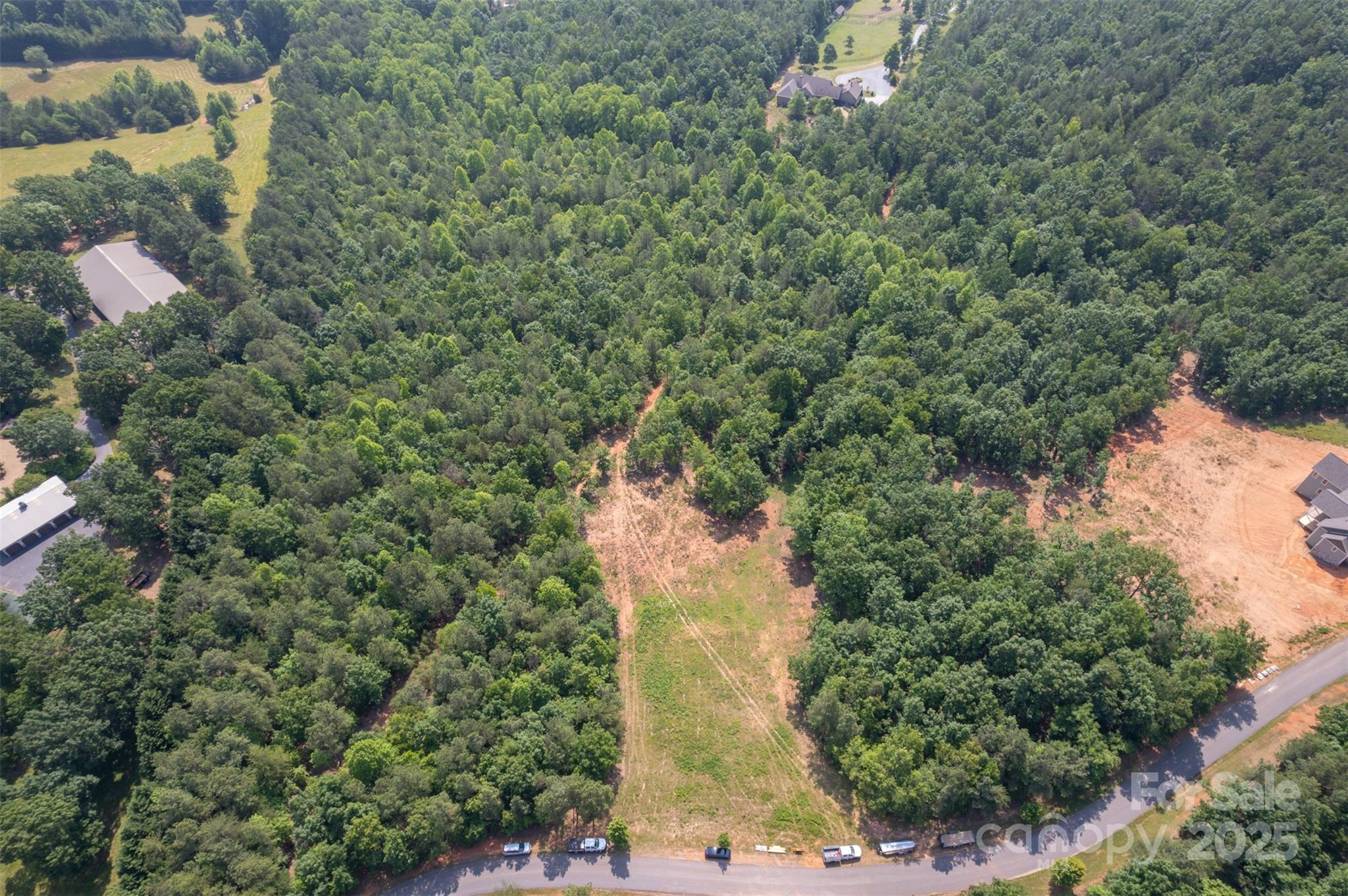 Lot 11 Prospect Point Drive Tryon, NC 28782 - Photo 8 of 16 an aerial view of a houses with yard