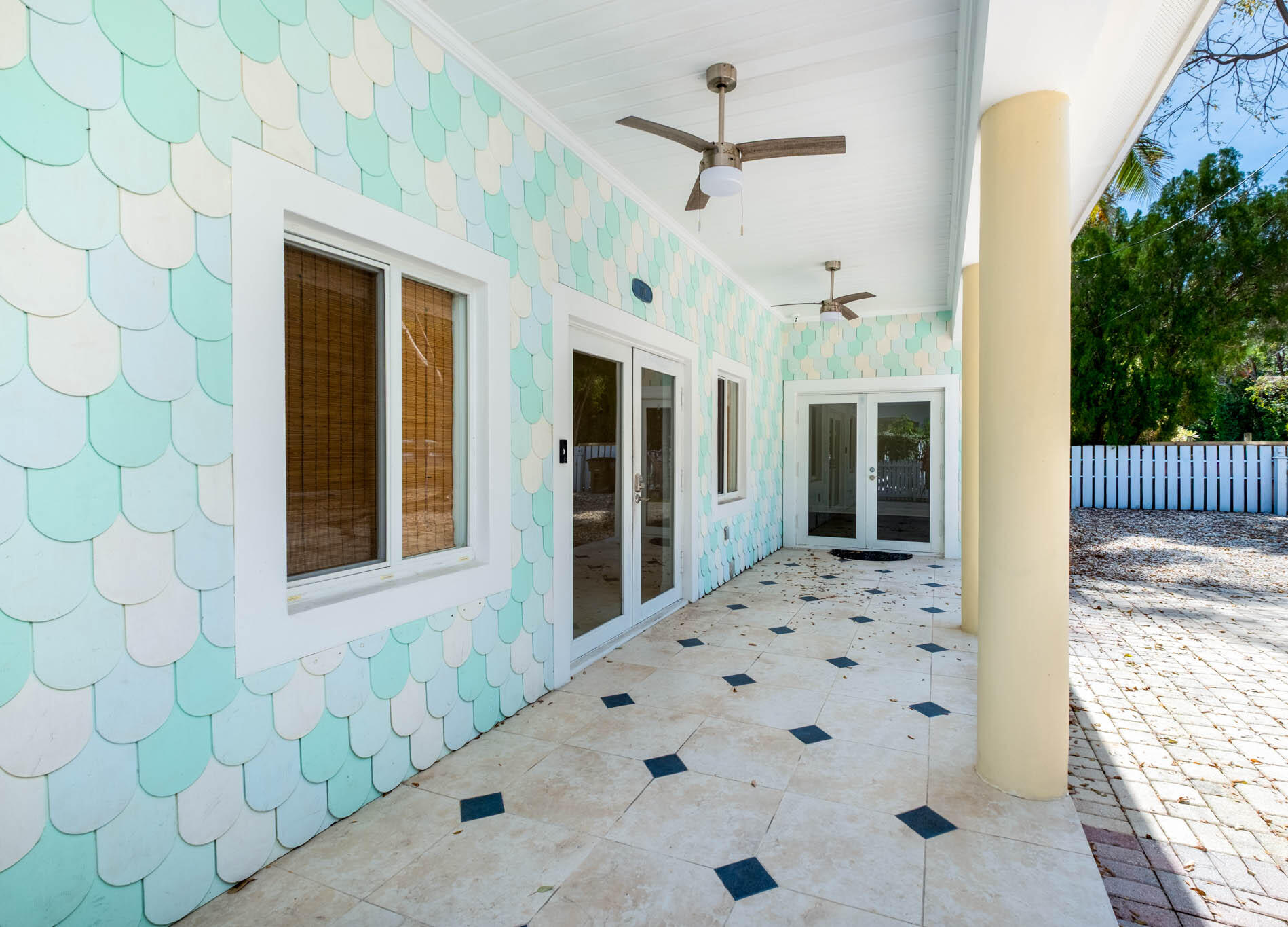 118 1st Street Key Largo, FL 33037 - Photo 2 of 25 a view of a entryway door of the house