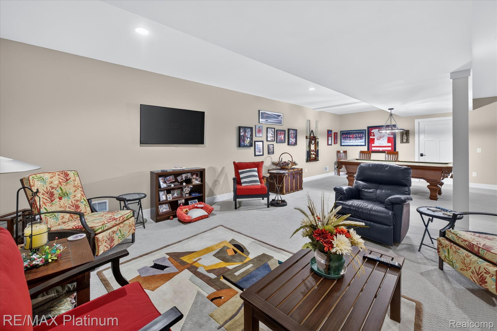 2676 Crooked Lake Road Howell, MI 48843 - Photo 39 of 60 Spacious recreation room featuring recessed lighting and neutral carpeting