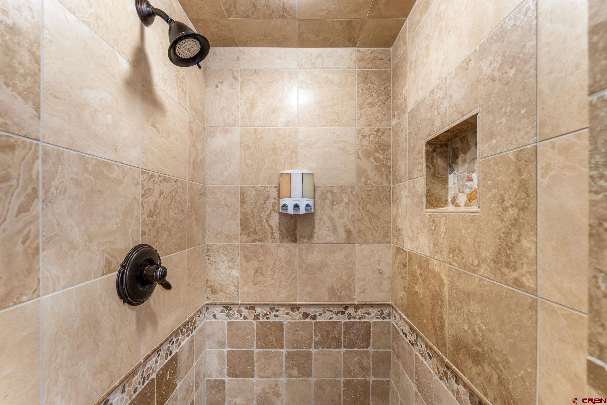 621 Gothic Road, Unit 2A Crested Butte, CO 81225 - Photo 20 of 34 a bathroom with a shower