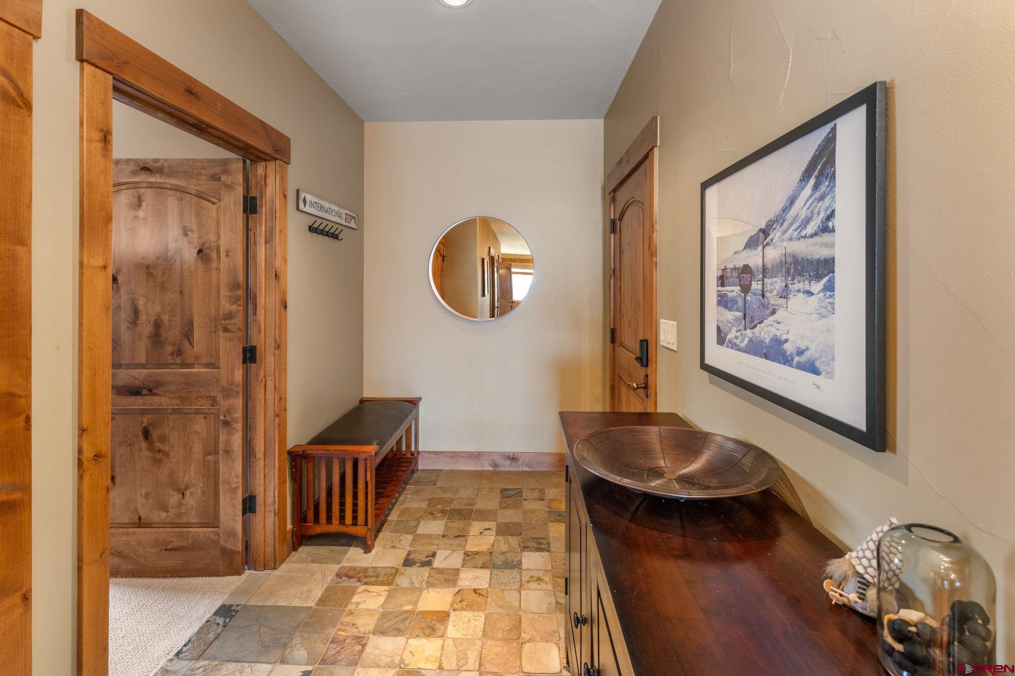 621 Gothic Road, Unit 2A Crested Butte, CO 81225 - Photo 3 of 34 a bathroom with a sink and a mirror