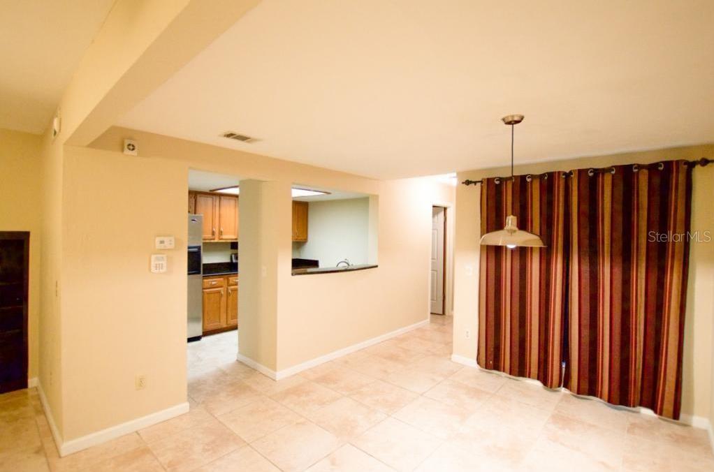 900 Southwest 62nd Boulevard, Unit D23 Gainesville, FL 32607 - Photo 4 of 37 a view of a hallway with wooden walls