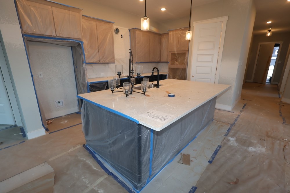 18603 Rumba Court Conroe, TX 77302 - Photo 4 of 15 a room with sink a washer and dryer