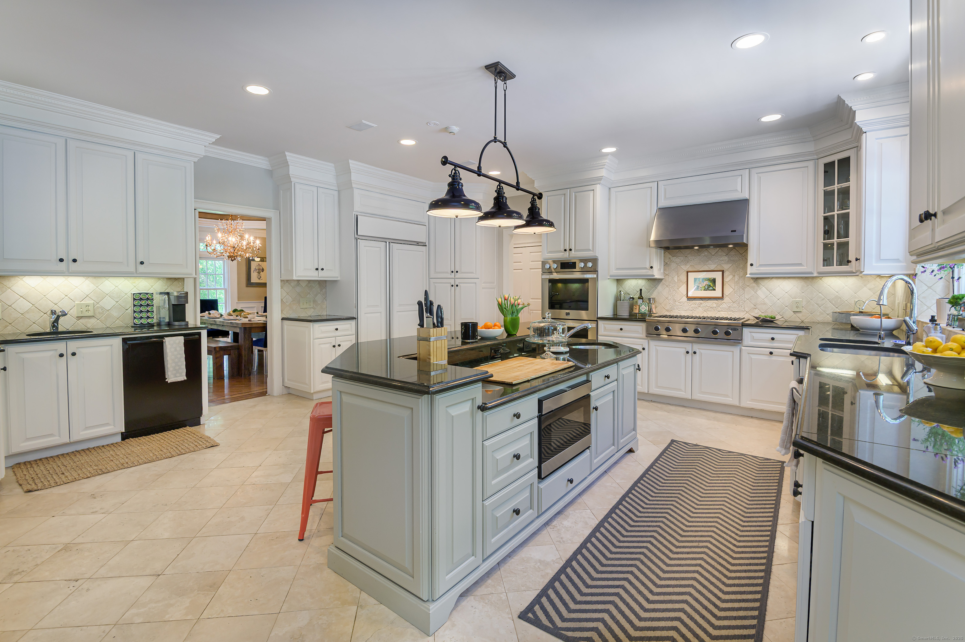 134 Nod Road Ridgefield, CT 06877 - Photo 13 of 40 a kitchen with stainless steel appliances granite countertop a stove oven and white cabinets