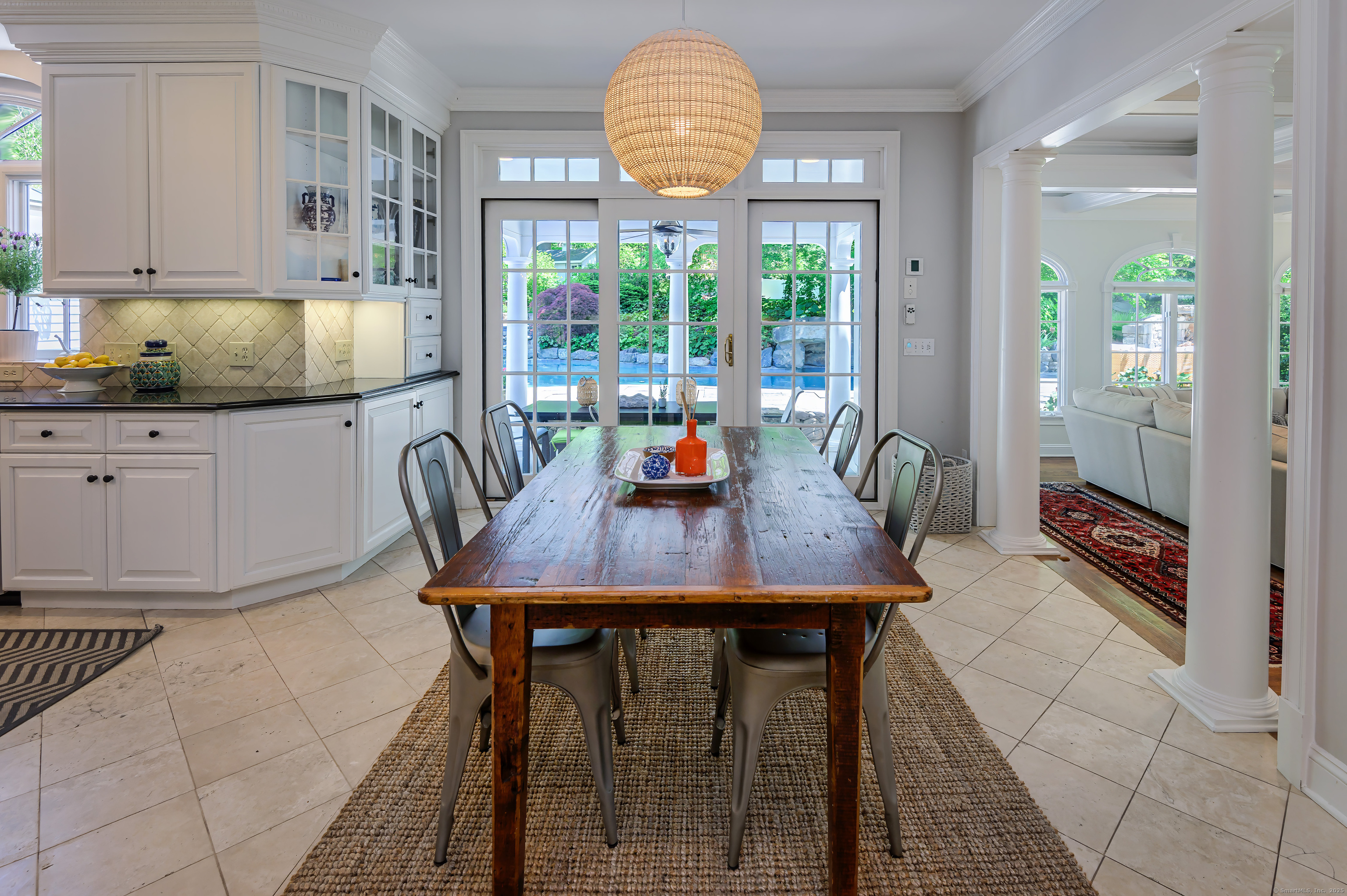 134 Nod Road Ridgefield, CT 06877 - Photo 15 of 40 a view of a dining room with furniture and window