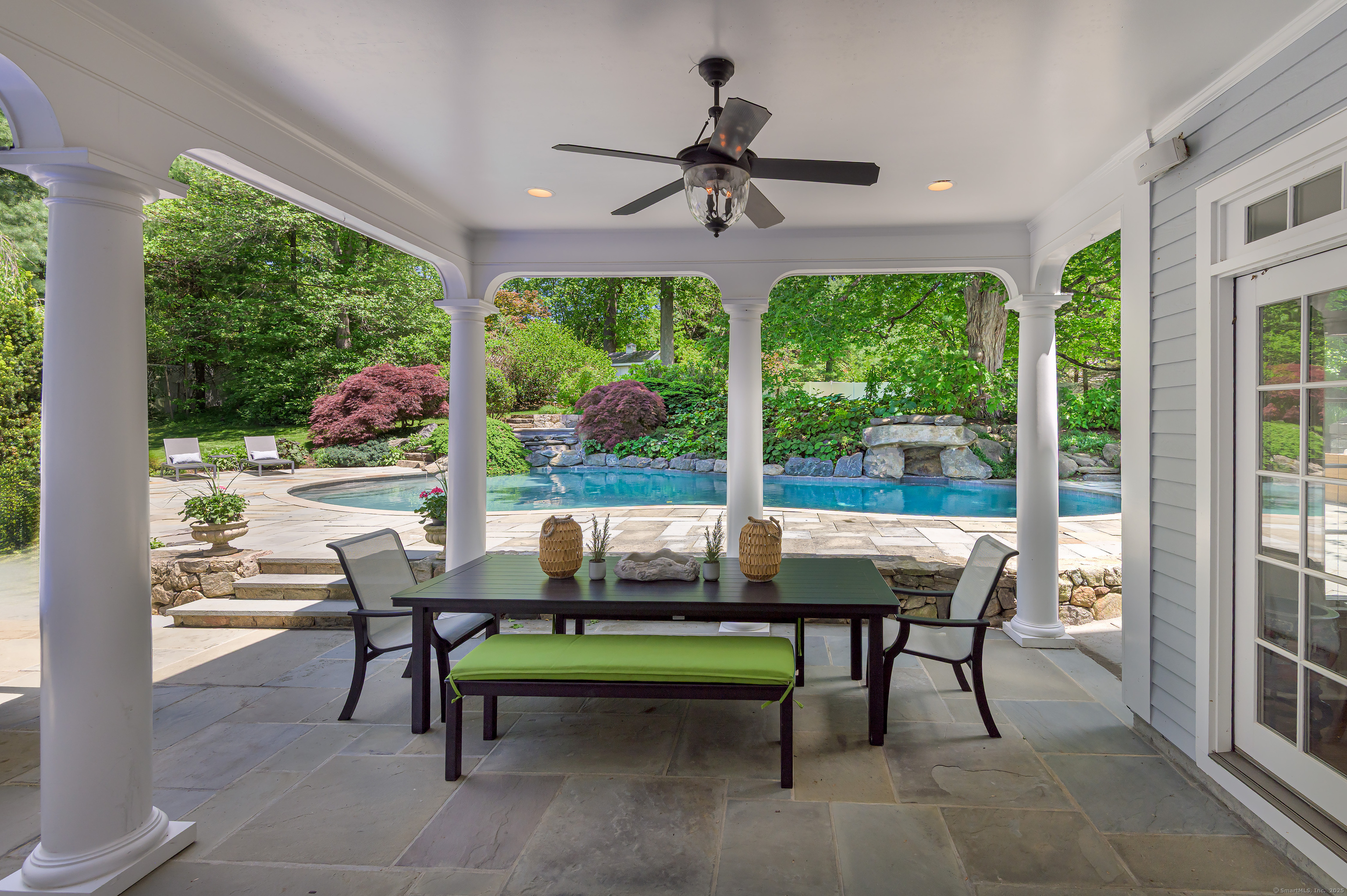 134 Nod Road Ridgefield, CT 06877 - Photo 16 of 40 a view of a dining room with furniture window and outside view