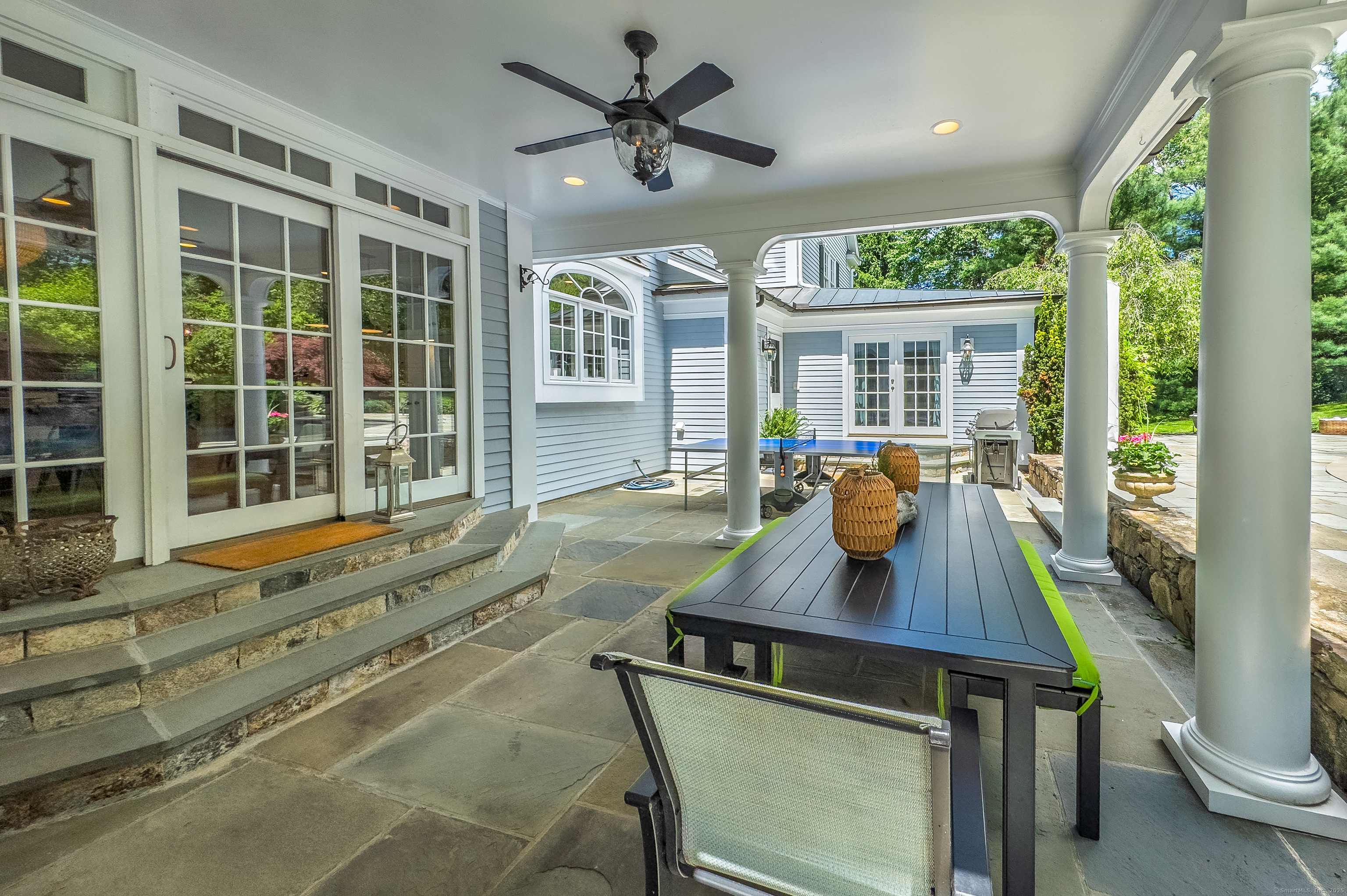 134 Nod Road Ridgefield, CT 06877 - Photo 18 of 40 a view of a dining room with furniture window and outside view