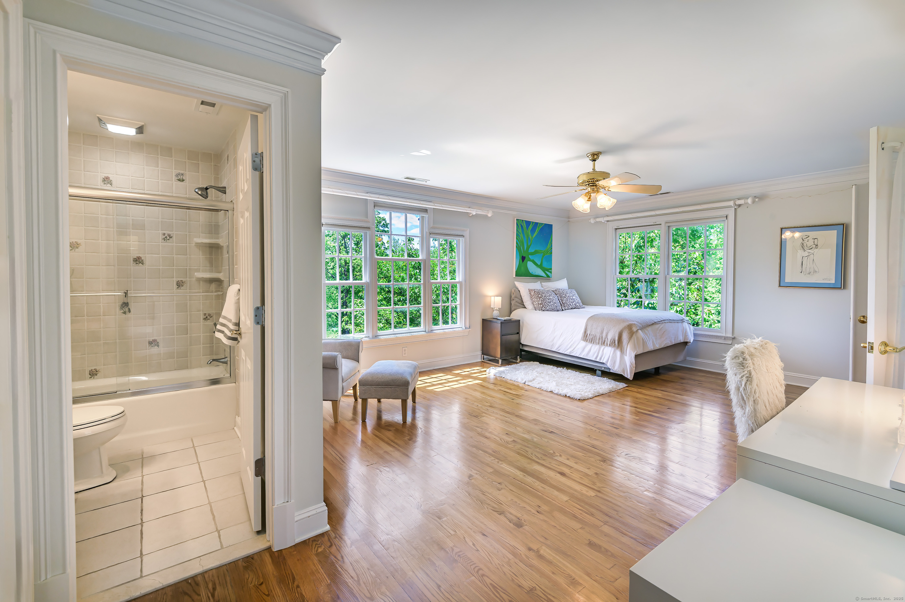 134 Nod Road Ridgefield, CT 06877 - Photo 28 of 40 a bedroom with furniture and a large window