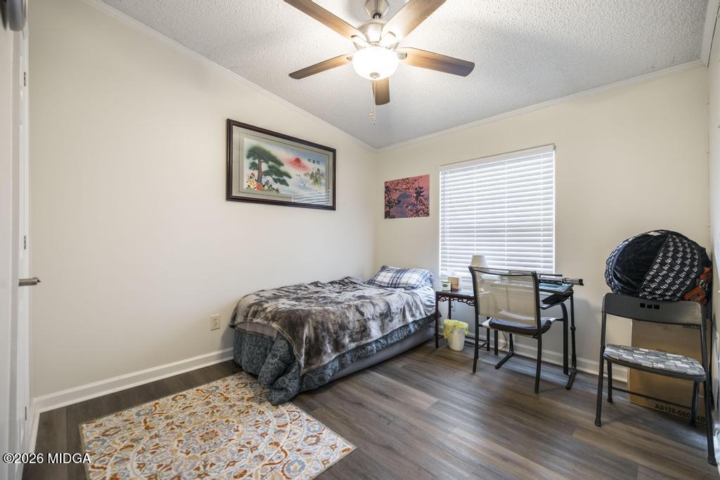 319 Pope Road Roberta, GA 31078 - Photo 22 of 42 a bedroom with bed and a window