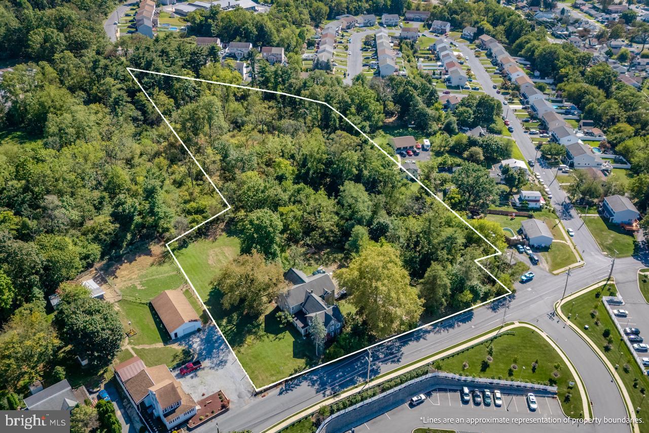 1220 Hay Road Temple, PA 19560 - Photo 11 of 24 an aerial view of swimming pool a yard and mountain view in back