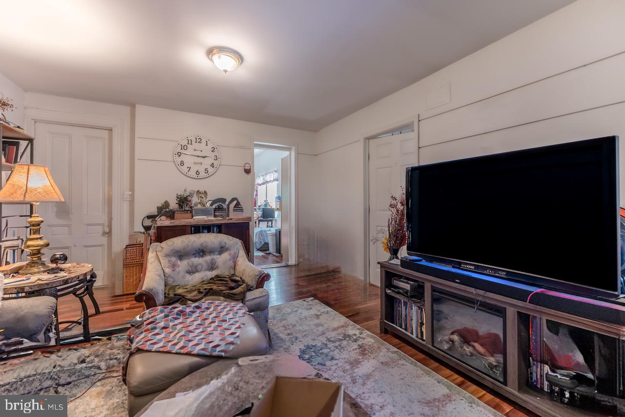 1220 Hay Road Temple, PA 19560 - Photo 15 of 24 a living room with furniture and a flat screen tv