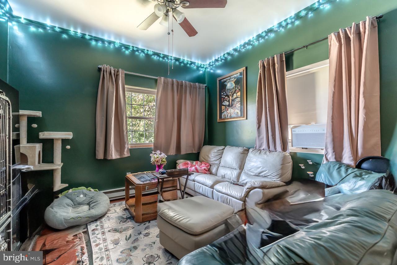 1220 Hay Road Temple, PA 19560 - Photo 22 of 24 a living room with furniture and a large window