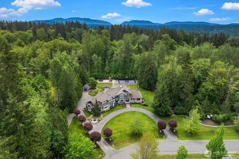 an aerial view of a golf course with outdoor space