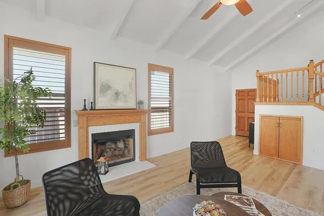 a kitchen with sink a counter space appliances and cabinets