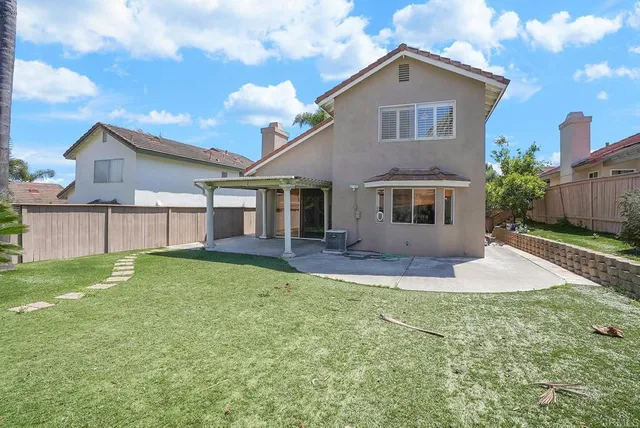 a view of backyard with green space