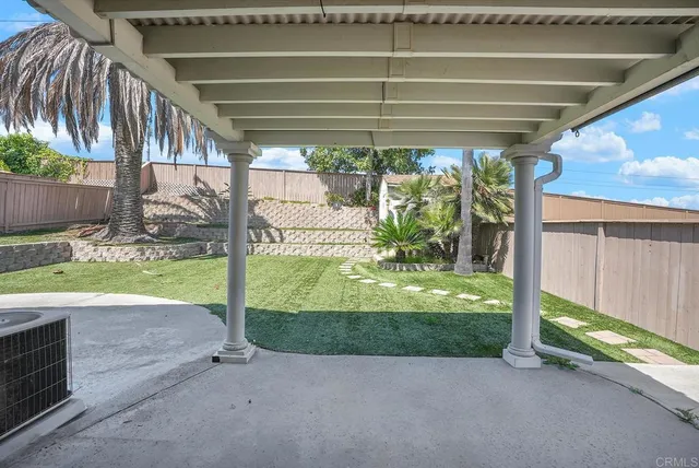 a view of a back yard of a house