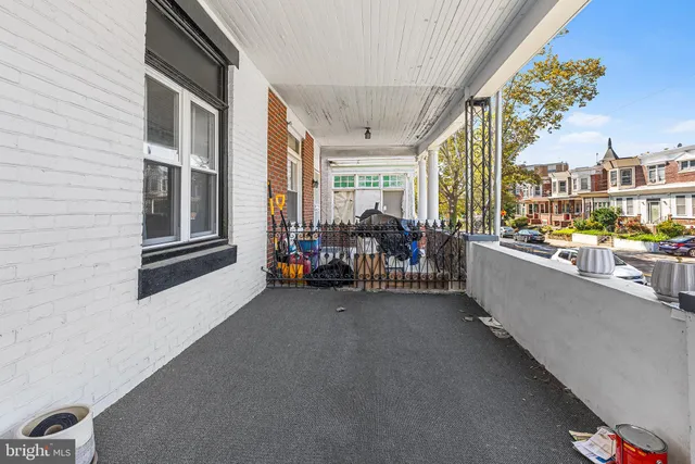 a view of a balcony with city view