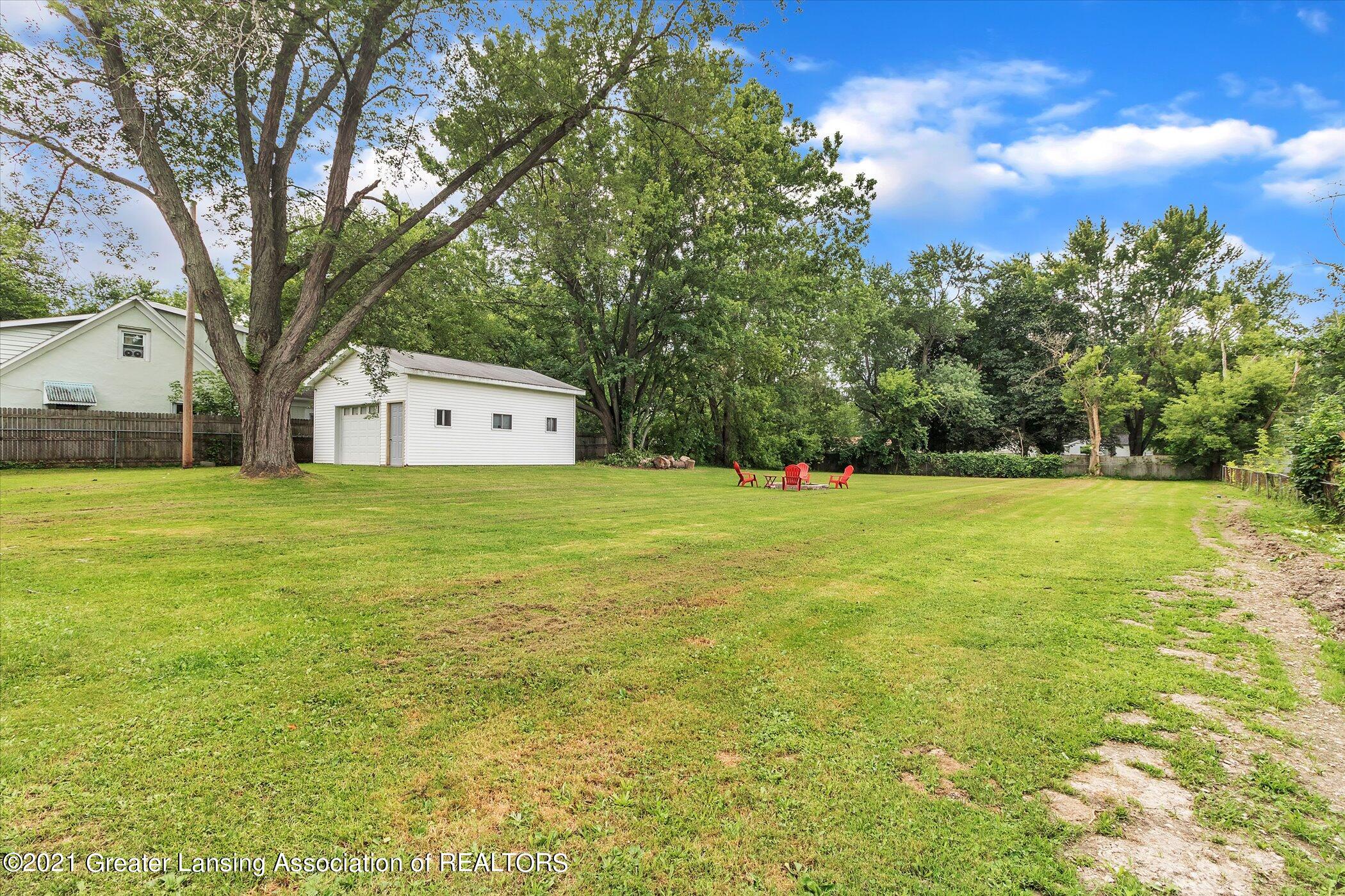 1327 Pierce Road Lansing, MI 48910 - Photo 30 of 34 yard with pole barn