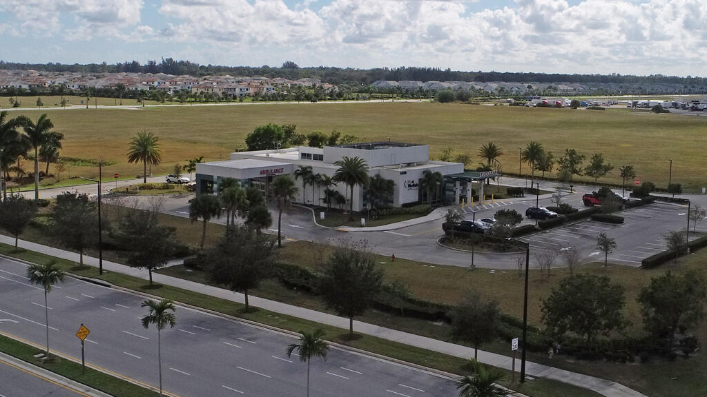 5010 Seminole Pratt Whitney Road Loxahatchee, FL 33470 - Photo 11 of 15 a view of a terrace with sitting area