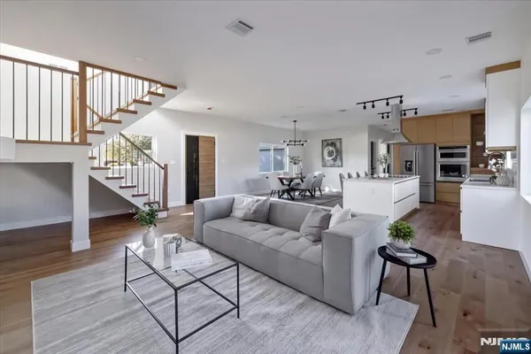 a living room with furniture and a table