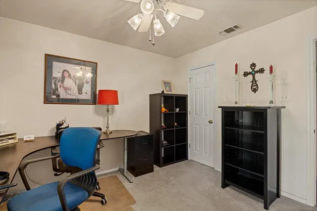 a workspace with furniture and window