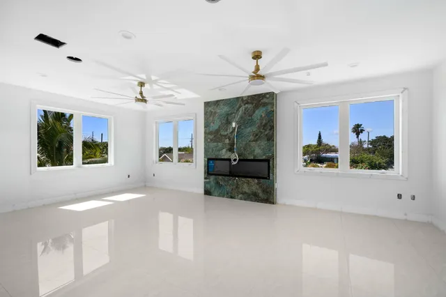 a view of livingroom with furniture window and natural light