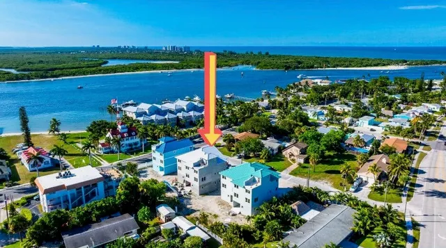 an aerial view of a house with a garden