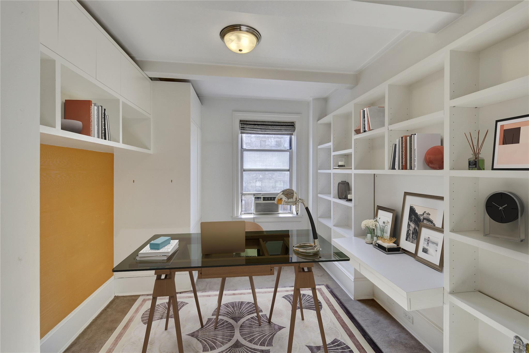 65 East 96th Street, Unit 16B Manhattan, NY 10128 - Photo 19 of 45 Home office with cooling unit and built in shelves