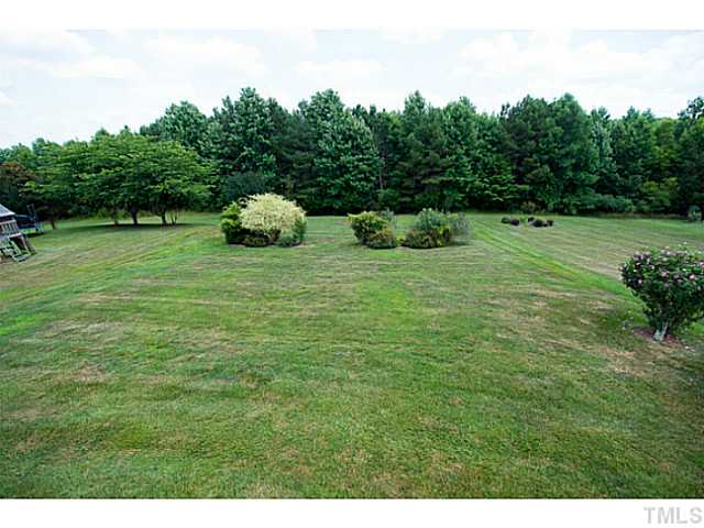 672 Seastone Street Raleigh, NC 27603 - Photo 21 of 23 One of the largest lots in the subdivision (.44 of an acre)! Irrigation. Lot extends to tree line.