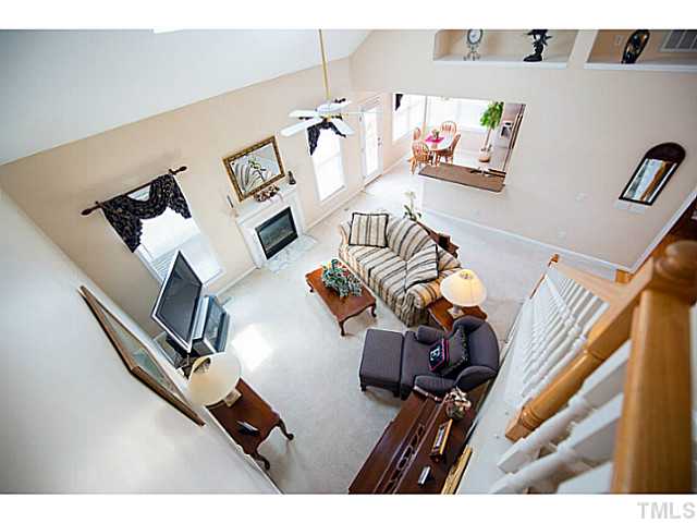 672 Seastone Street Raleigh, NC 27603 - Photo 4 of 23 Aerial view of the family room from the second floor overlook.