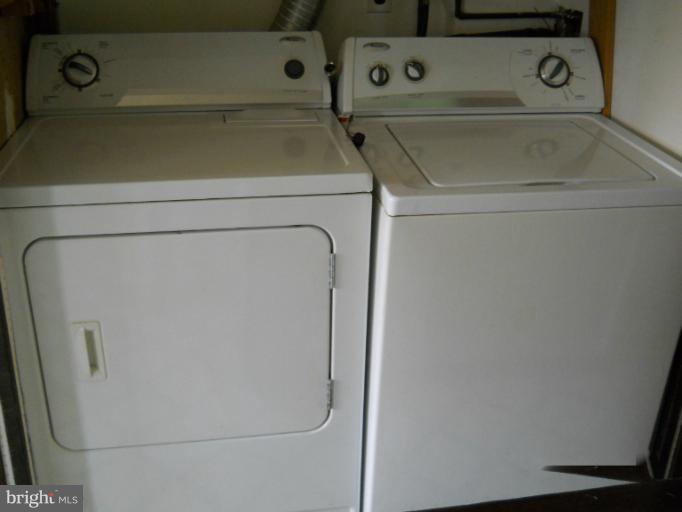 8186 Mid Haven Road Dundalk, MD 21222 - Photo 20 of 21 a utility room with dryer and washer