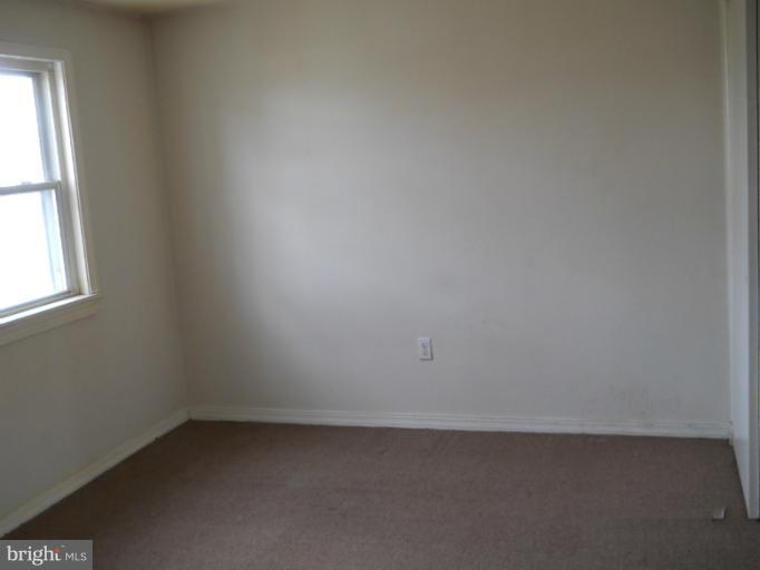 8186 Mid Haven Road Dundalk, MD 21222 - Photo 3 of 21 an empty room with a window