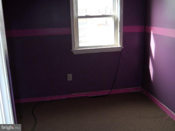 8186 Mid Haven Road Dundalk, MD 21222 - Photo 5 of 21 a room that has a window in it