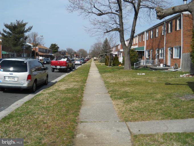 8186 Mid Haven Road Dundalk, MD 21222 - Photo 6 of 21 a view of a street with cars