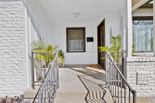 a view of balcony and wooden floor